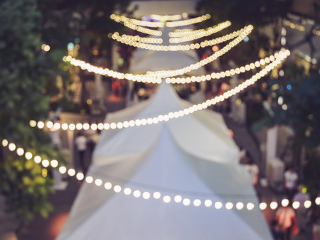festival event party blurred people background lights decoration outdoor